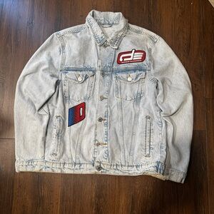 Light Wash Denim Jacket with Red Patch Details